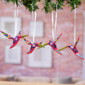 Set of 4 Handcrafted Copal Wood Bird Ornaments in Carmine - Carmine Flutter